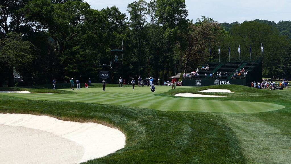 No. 9 | Par 3 | 211 yds. Guarded by bunkers, you...