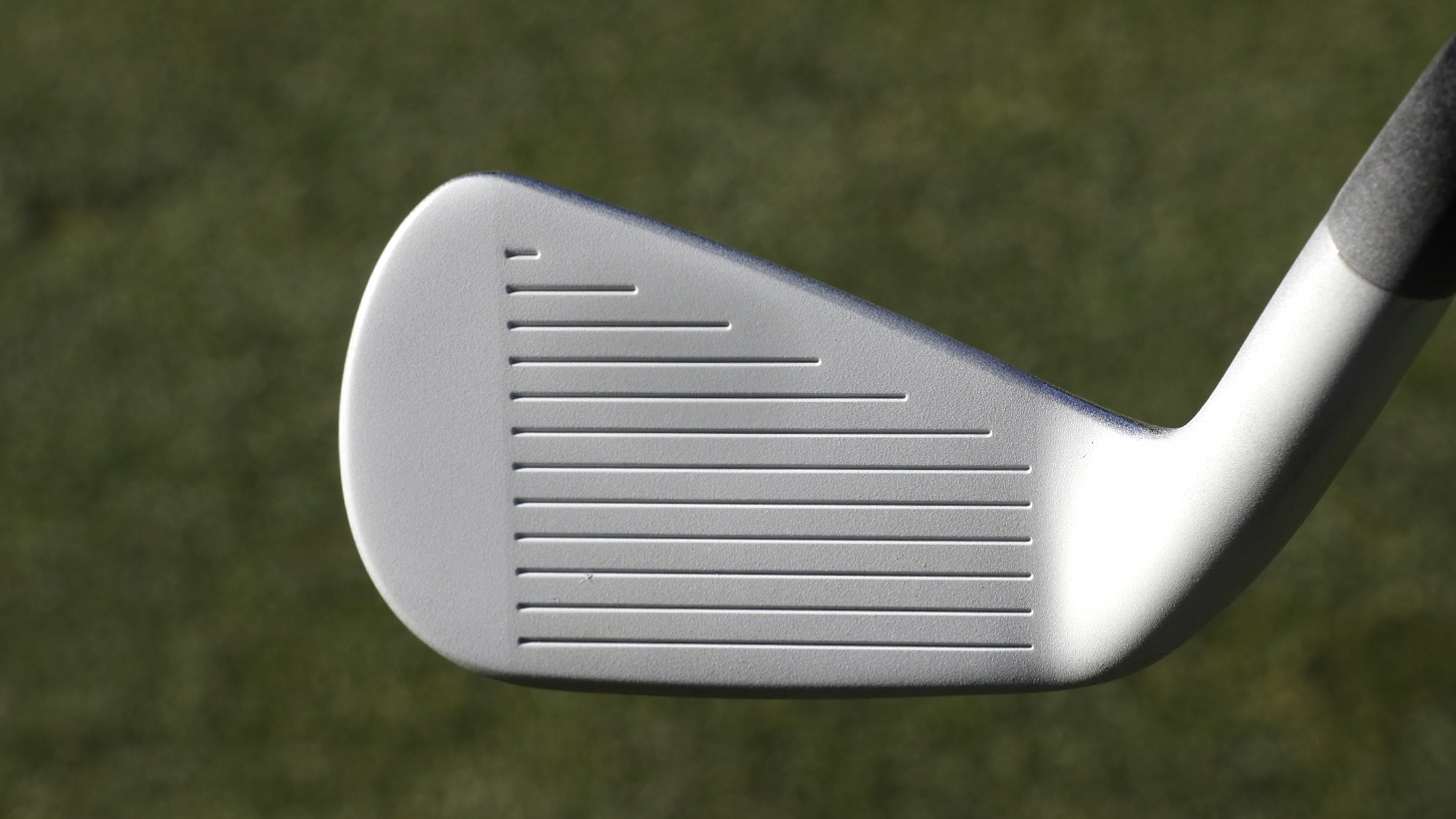 Club face after a thin coating of foot spray.