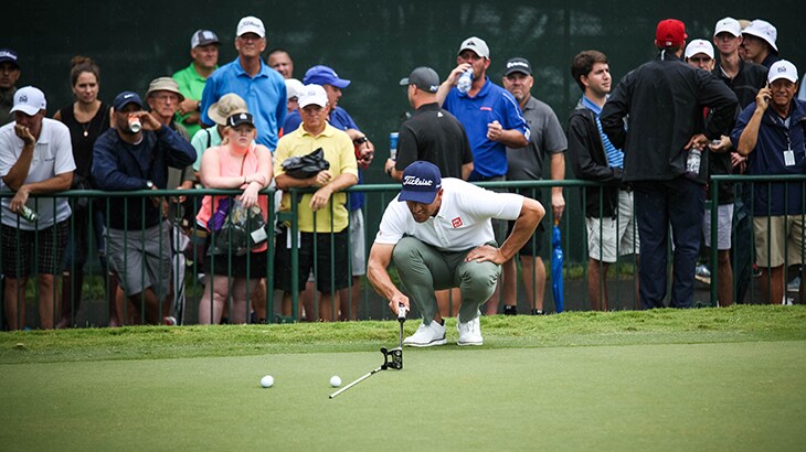 Scott works with his Scotty Cameron putter in...