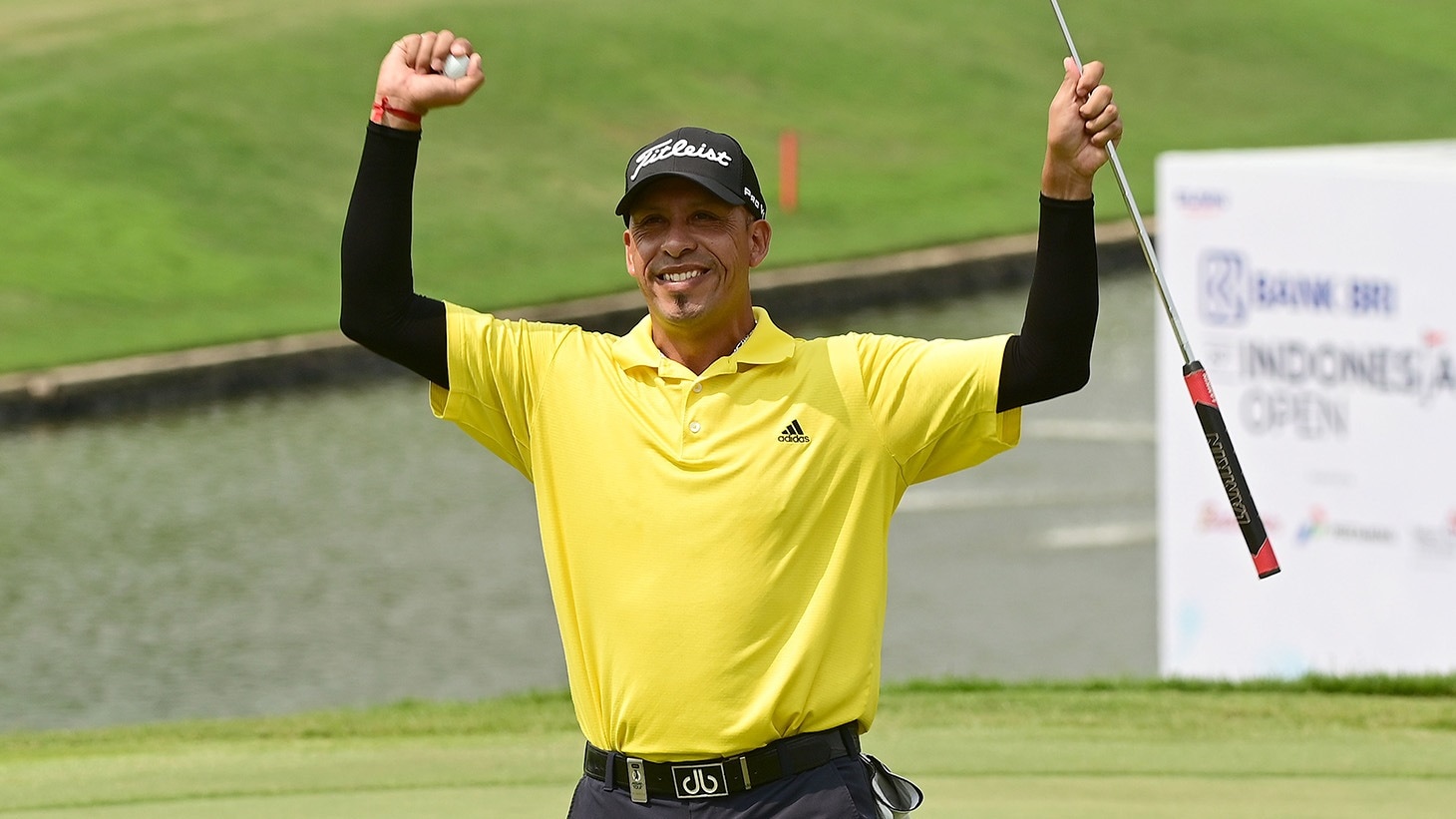 Miguel Carballo raises his arms in victory after holing the winning putt with his Pro V1 golf ball at the 2019 BRI Indonesia Open